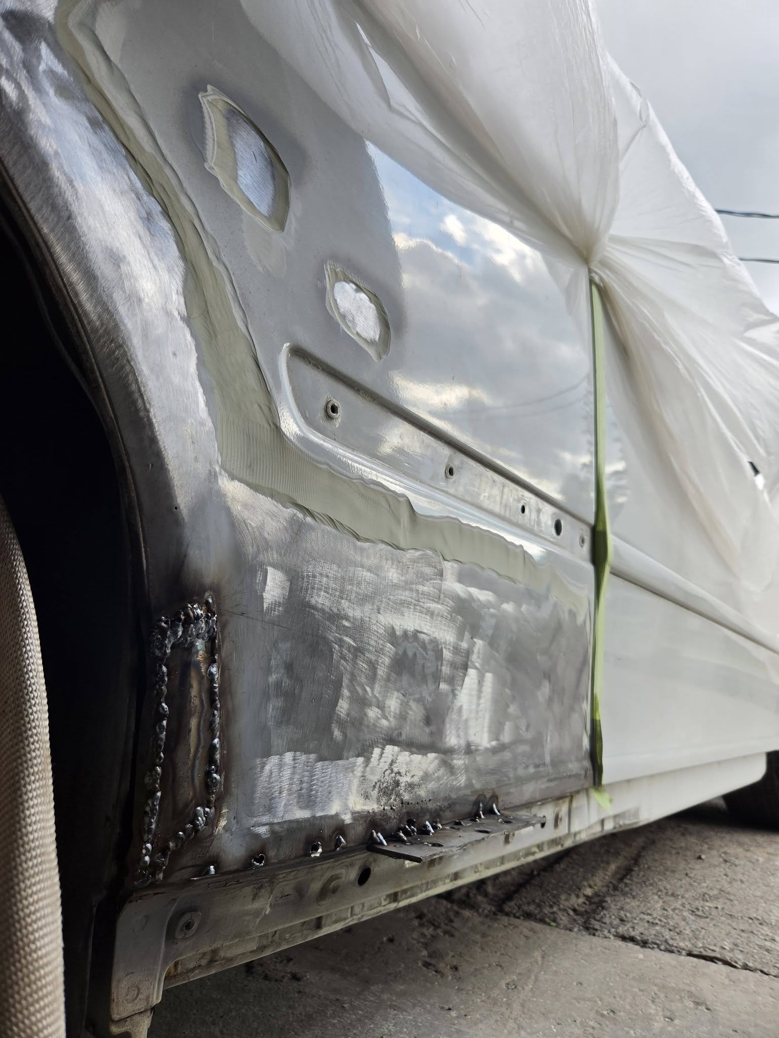 Repaired rocker panel after fabrication and refinish